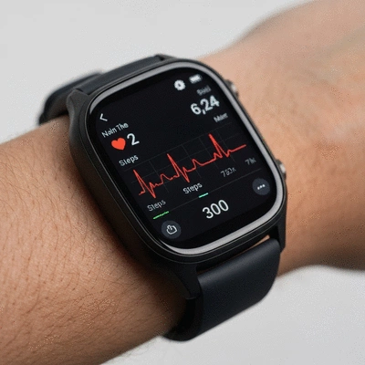 Close-up of a smartwatch display showing detailed health metrics like heart rate and steps